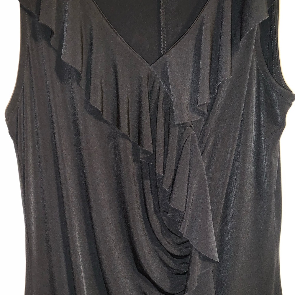 NWOT Autonomy Black dress in sz Med. Beautiful silhouette. Drapes, but fitted.